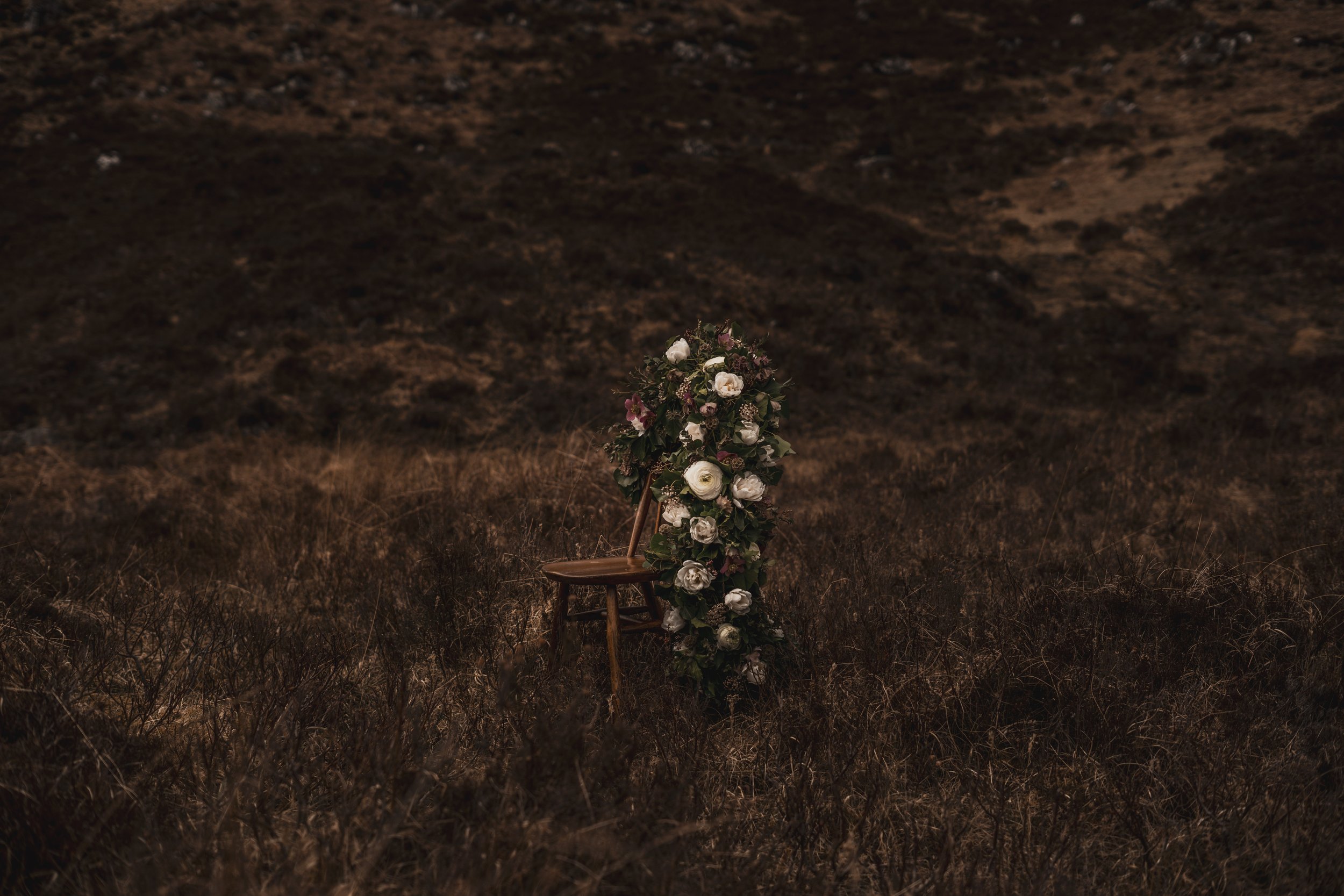 Floral display on a wooden chair